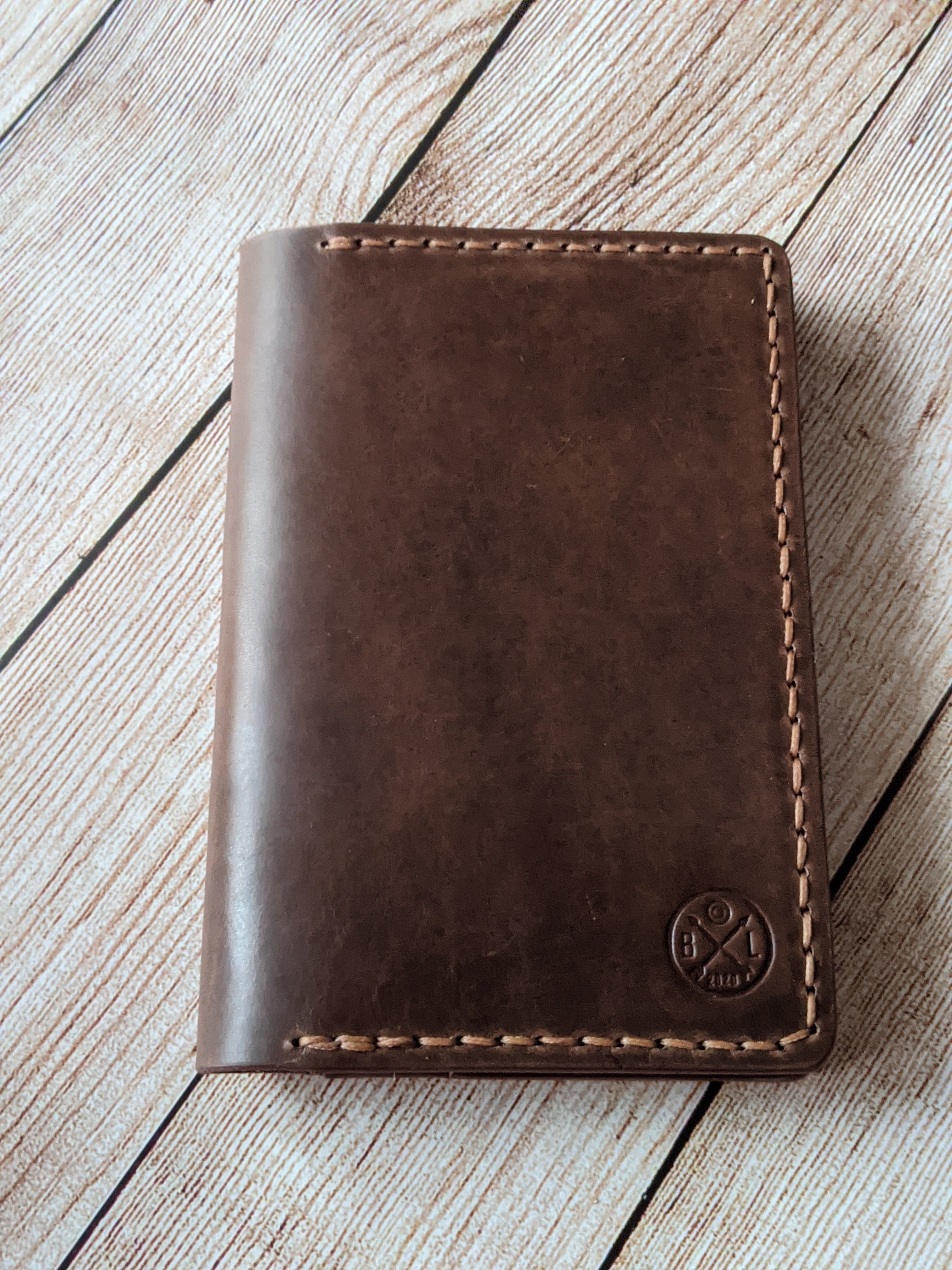 "Warner" Passport Case in Chocolate Vegtan Leather with Amber Glow thread.