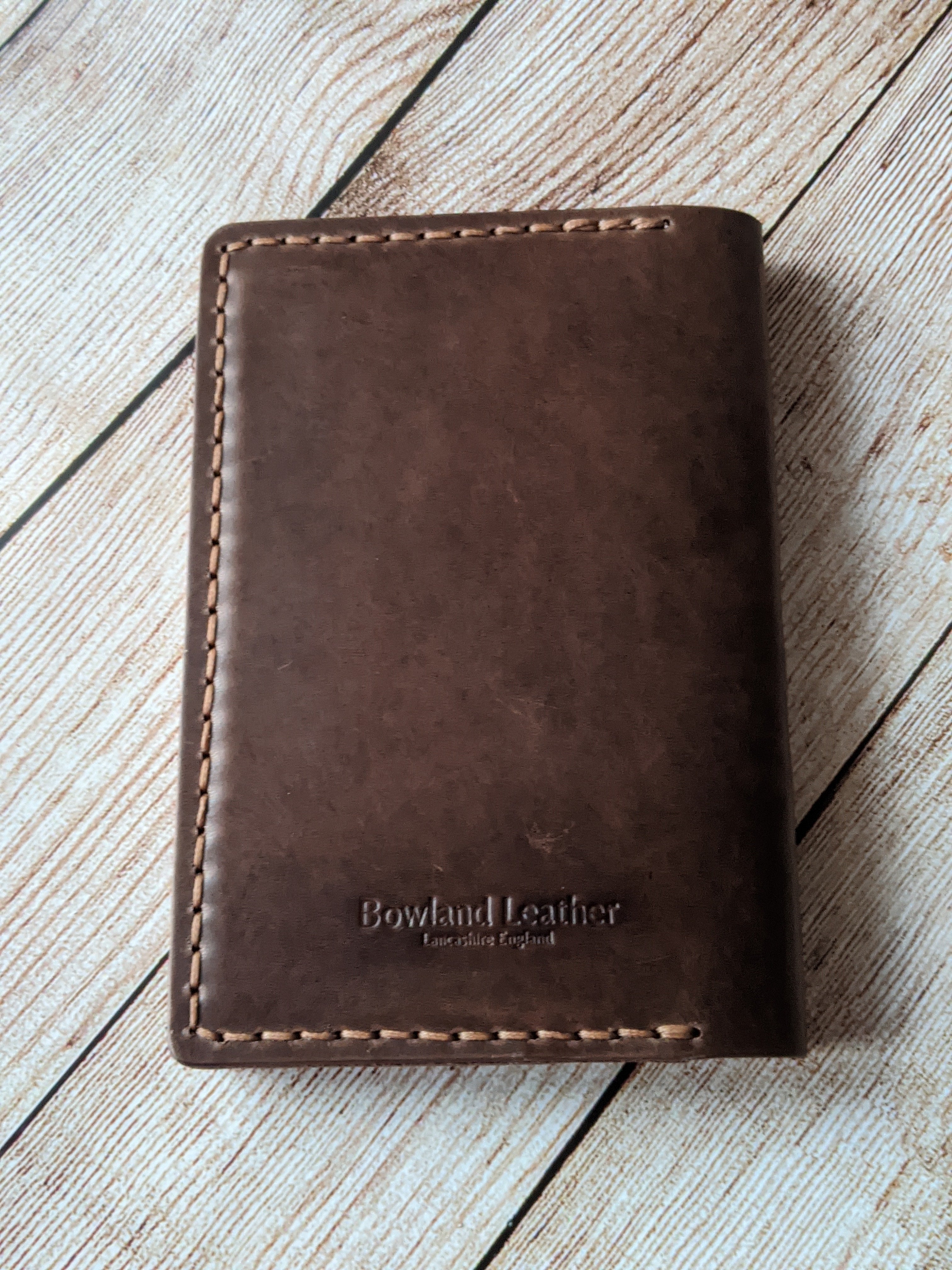 "Warner" Passport Case in Chocolate Vegtan Leather with Amber Glow thread.